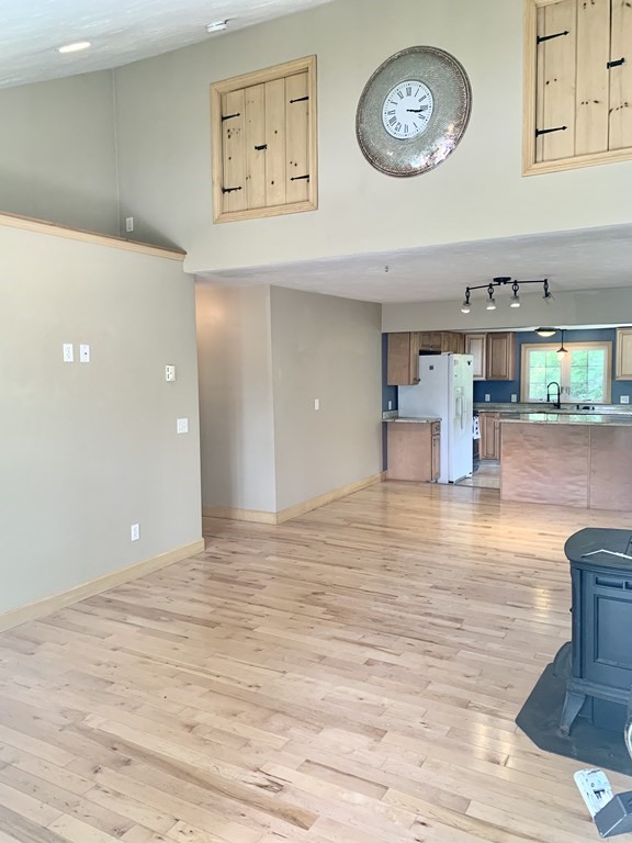 46 New Boston Road Sturbridge, MA 01566 - Photo 3 of 14 a view of a room with wooden floor