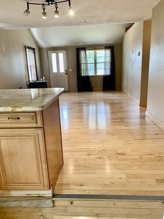 46 New Boston Road Sturbridge, MA 01566 - Photo 7 of 14 a view of a living room kitchen and bathroom