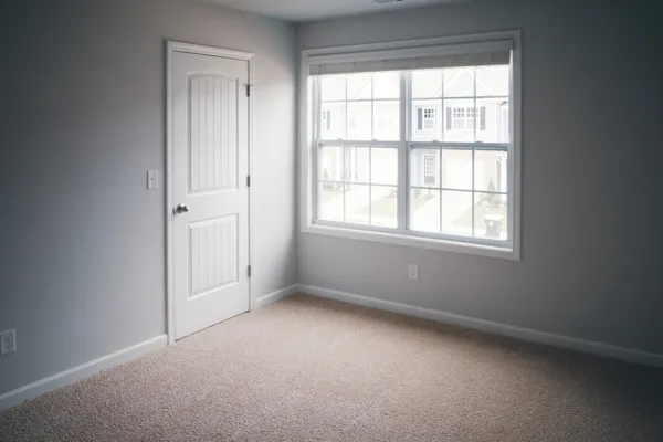 an empty room with windows