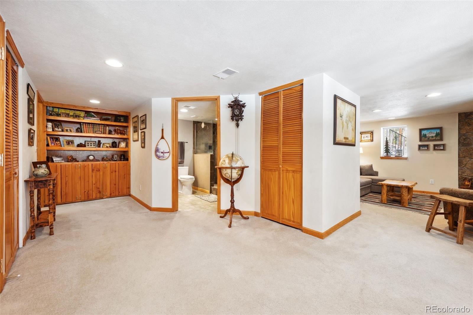 266 Lodgepole Drive Evergreen, CO 80439 - Photo 20 of 45 a view of livingroom with furniture and refrigerator