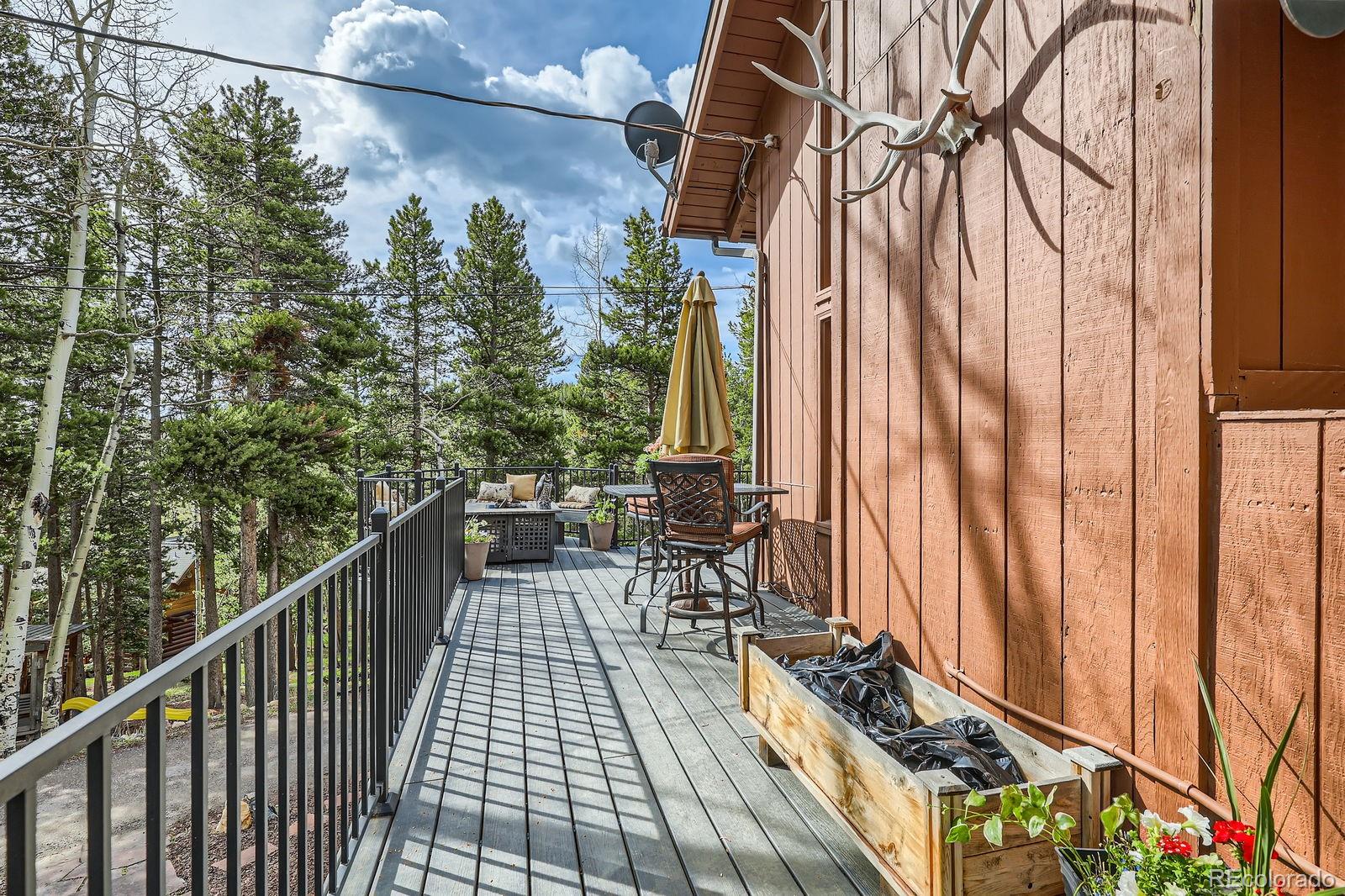 266 Lodgepole Drive Evergreen, CO 80439 - Photo 35 of 45 a view of balcony with furniture