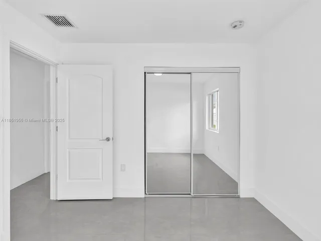 a view of a closet in a room