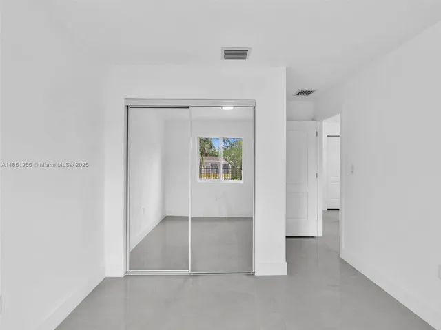 an empty room with a window