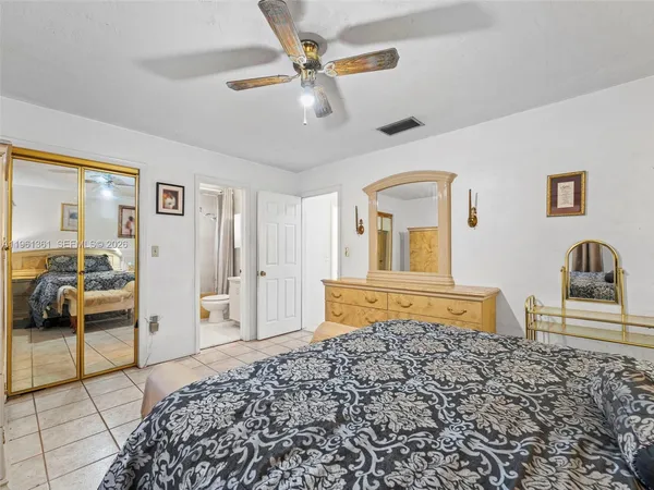 a bathroom with a sink a mirror and a toilet