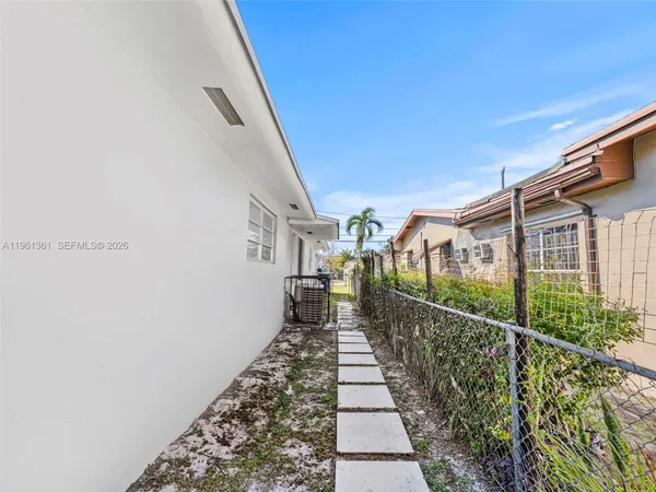 a view of a garden with pathway