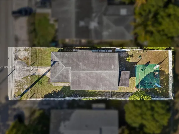 a kitchen with stainless steel appliances granite countertop a refrigerator sink and cabinets