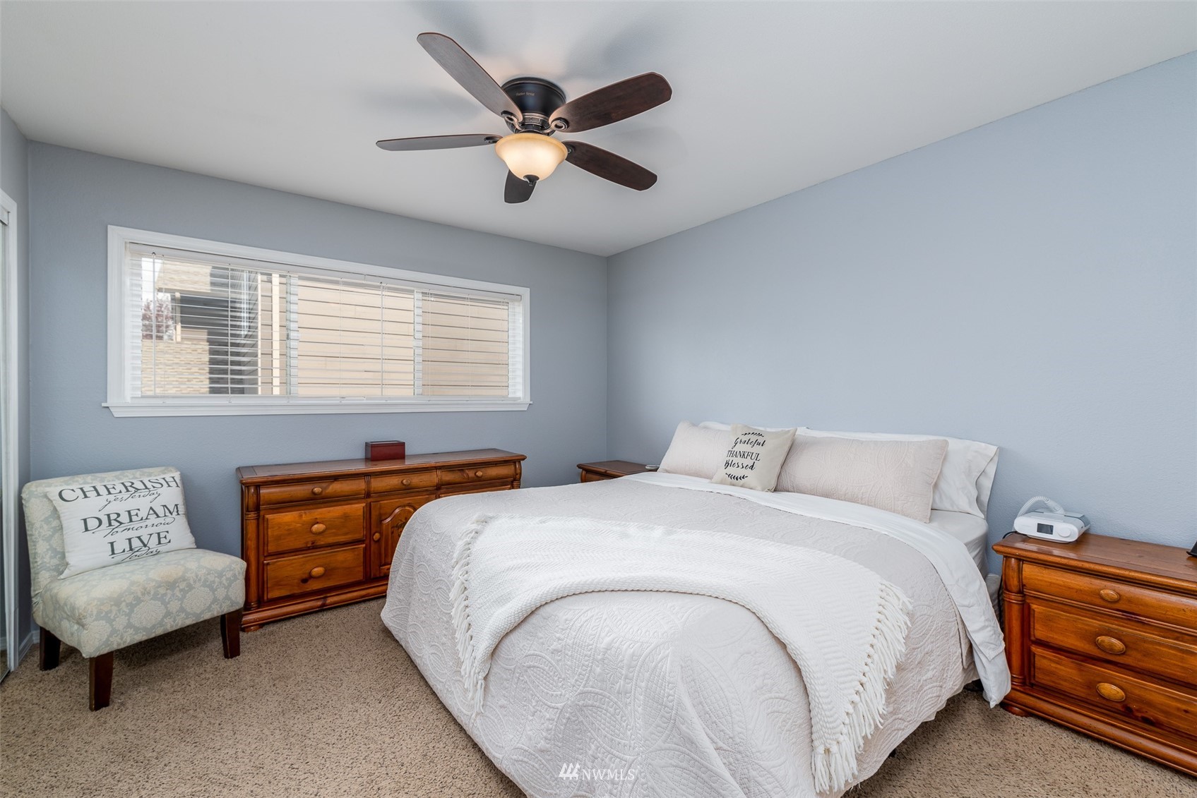 6093 Captain's Way Ferndale, WA 98248 - Photo 13 of 32 a bed room with a bed and a couch