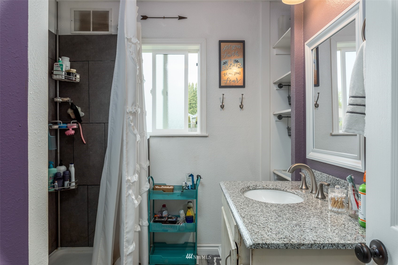 6093 Captain's Way Ferndale, WA 98248 - Photo 17 of 32 a bathroom with a granite countertop sink and a mirror