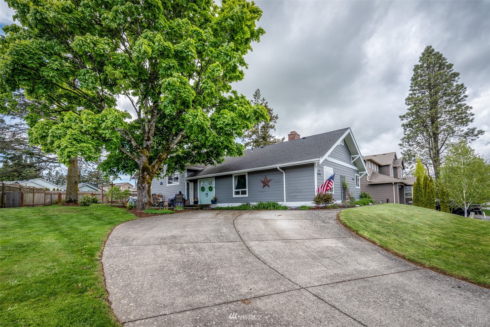 6093 Captain's Way Ferndale, WA 98248 - Photo 22 of 32 a front view of a house with a yard