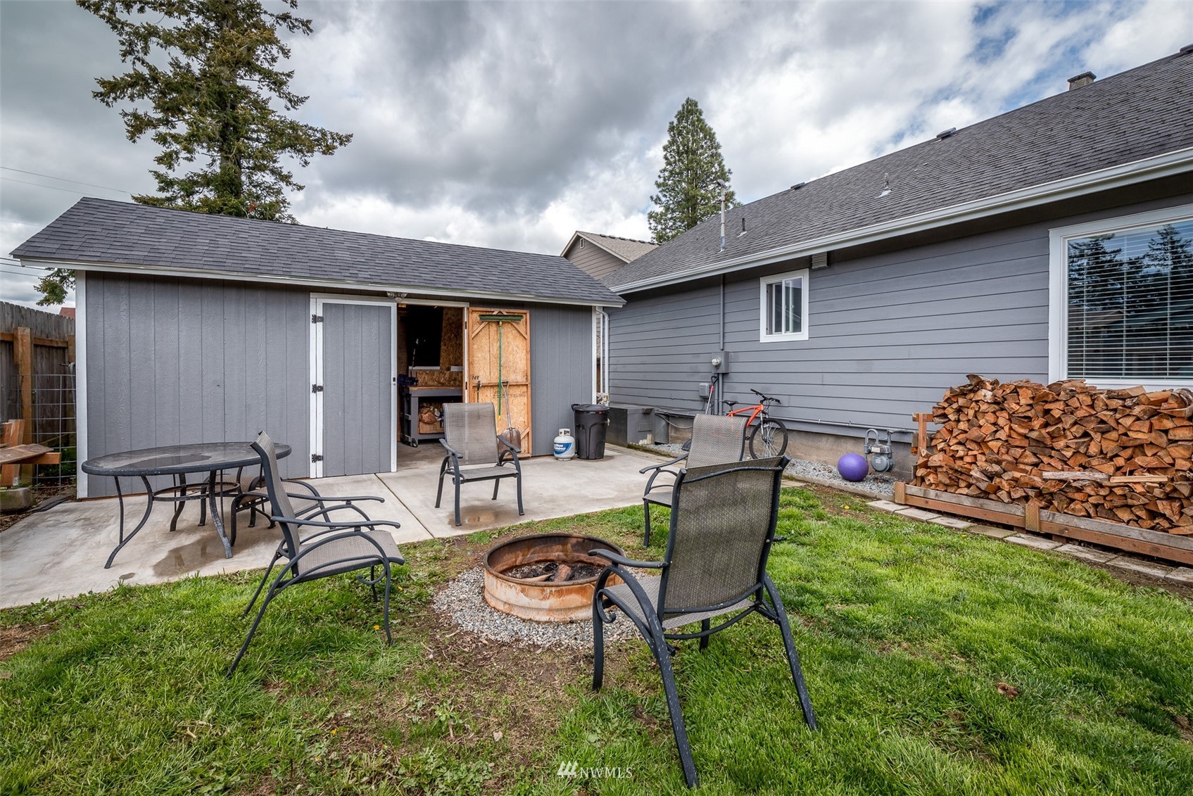 6093 Captain's Way Ferndale, WA 98248 - Photo 24 of 32 a view of a backyard with furniture