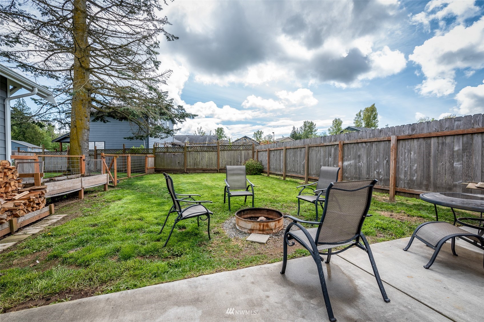 6093 Captain's Way Ferndale, WA 98248 - Photo 28 of 32 a view of backyard with seating and green space