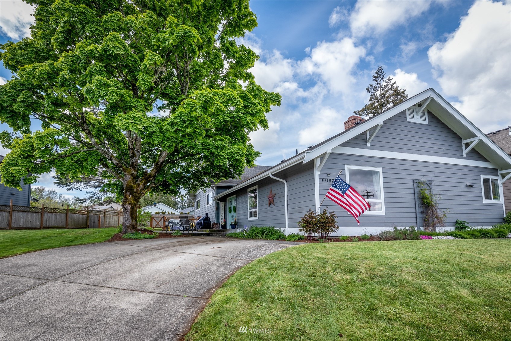 6093 Captain's Way Ferndale, WA 98248 - Photo 32 of 32 a view of a house with backyard and garden