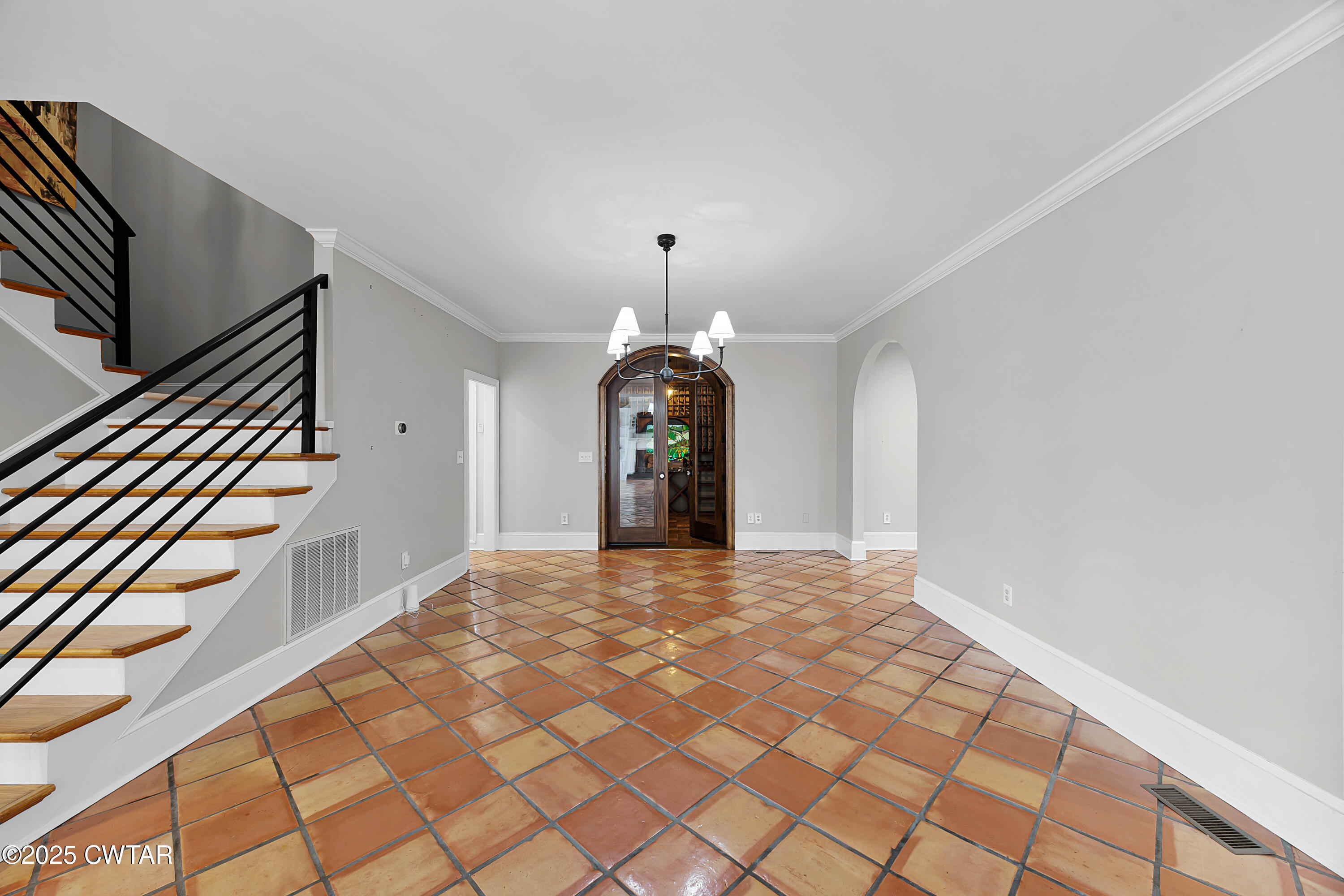 40 Winfield Place Jackson, TN 38305 - Photo 15 of 37 a view of an empty room with wooden floor