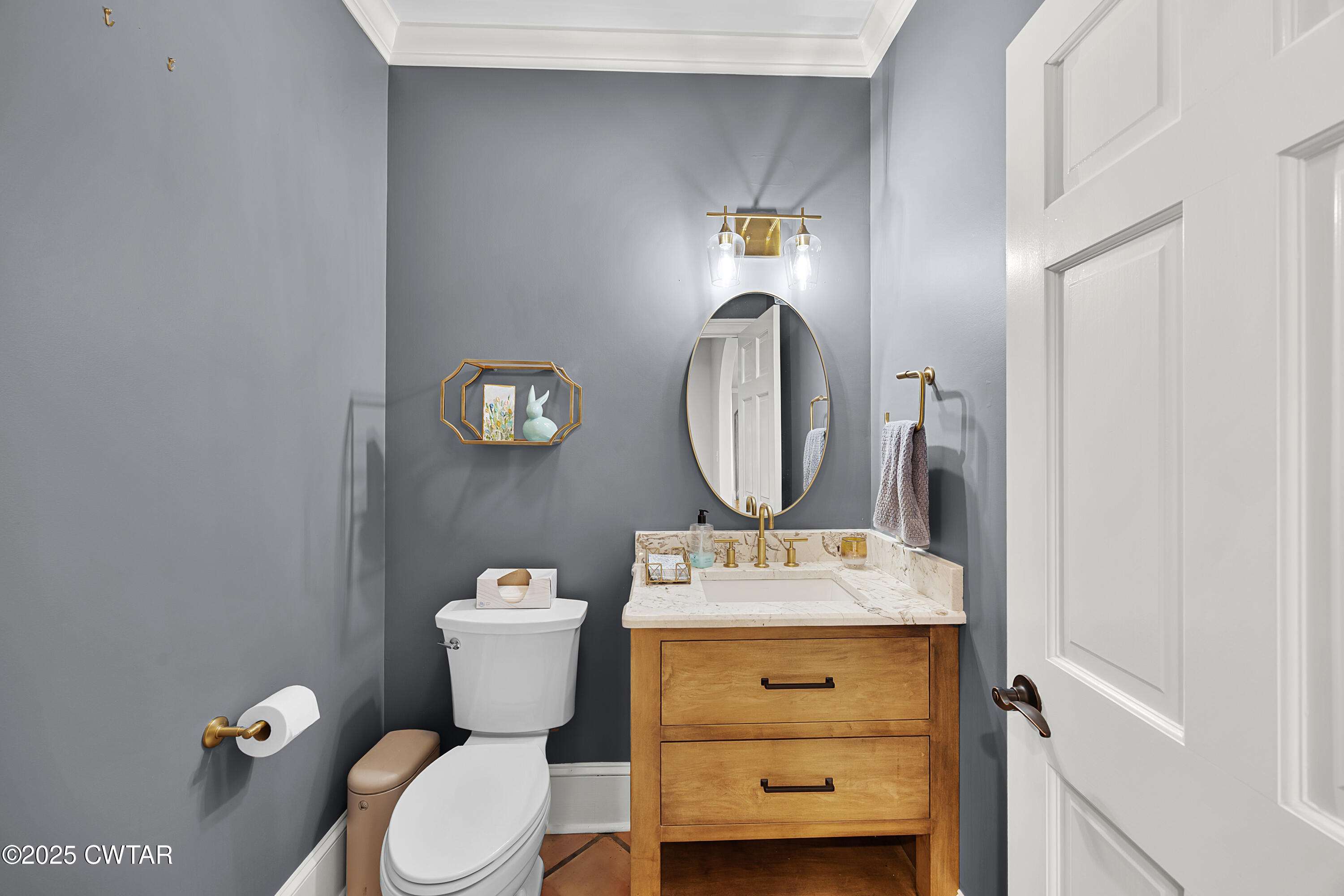 40 Winfield Place Jackson, TN 38305 - Photo 17 of 37 a bathroom with a toilet mirror and vanity