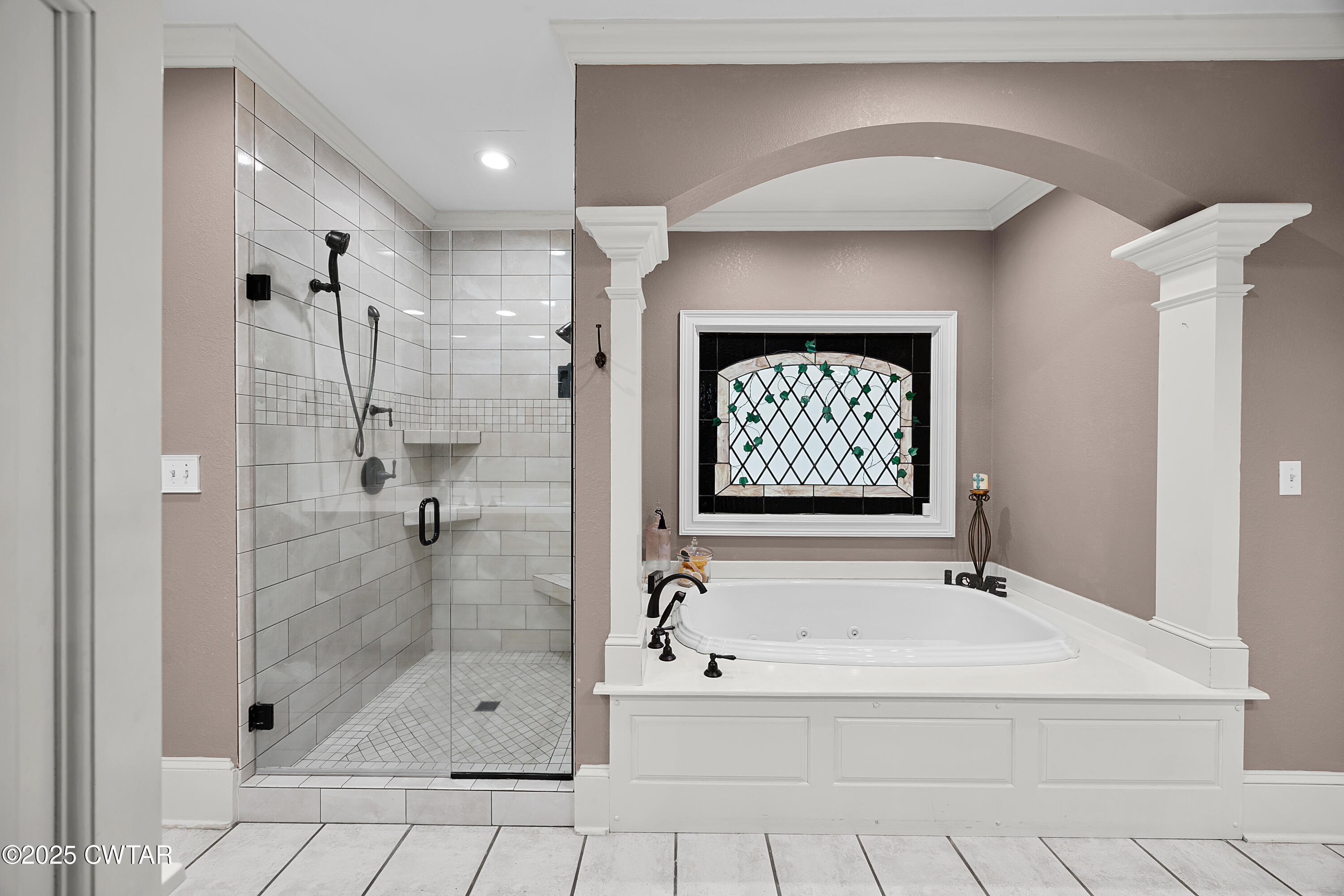 40 Winfield Place Jackson, TN 38305 - Photo 20 of 37 a bathroom with a bathtub and a shower