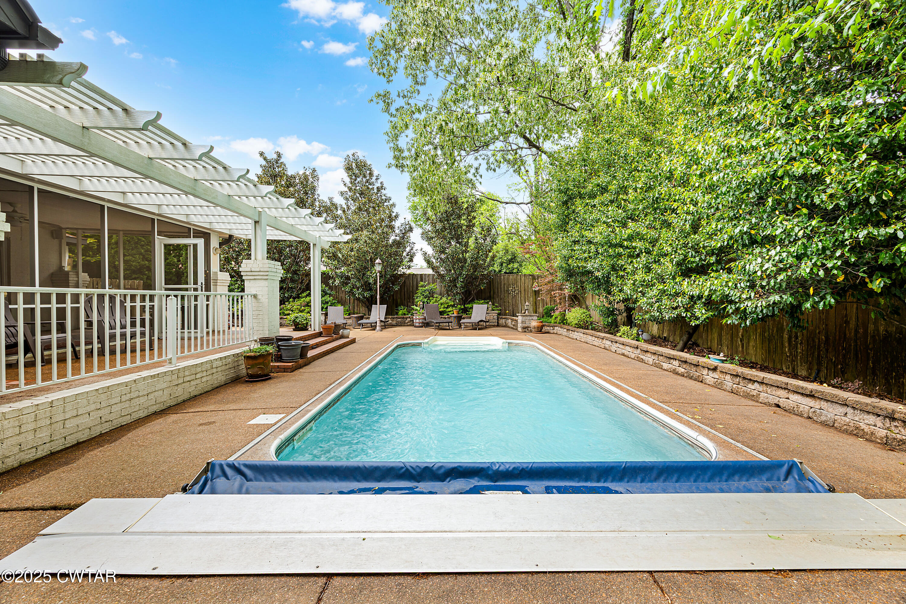 40 Winfield Place Jackson, TN 38305 - Photo 32 of 37 a view of a backyard with swimming pool