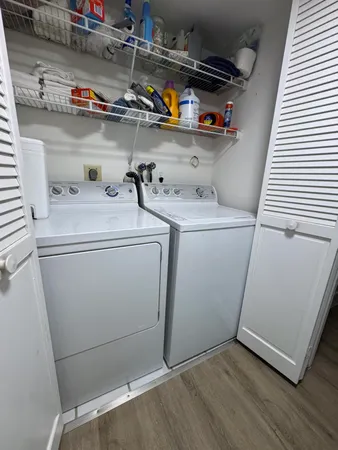 a utility room with dryer and washer