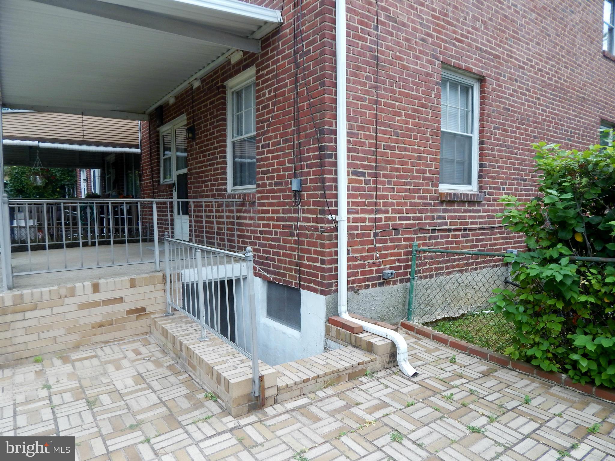 1884 Yakona Road Baltimore, MD 21234 - Photo 18 of 19 a view of a brick house with a yard