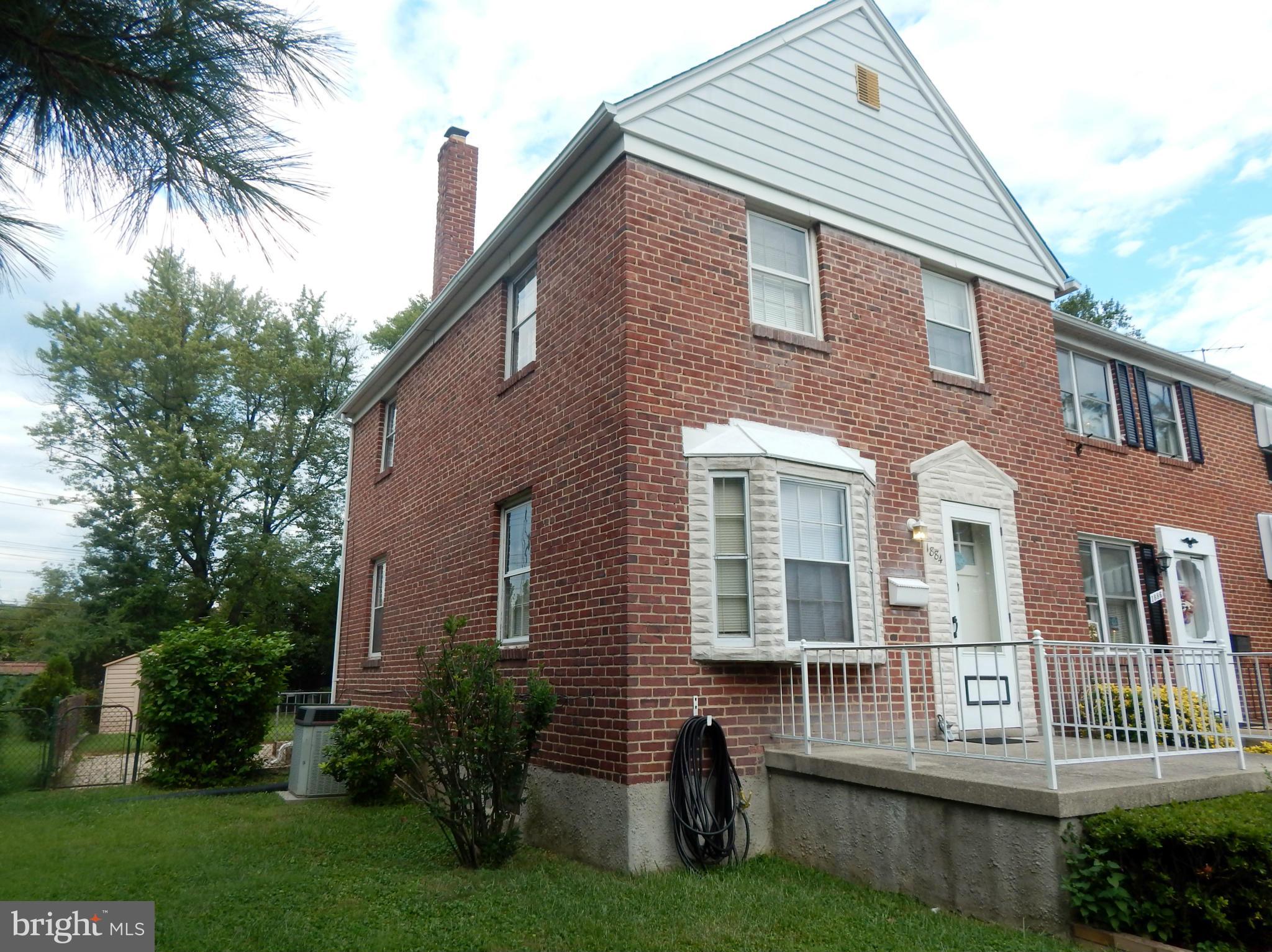 1884 Yakona Road Baltimore, MD 21234 - Photo 2 of 19 a front view of a house with a garden and plants