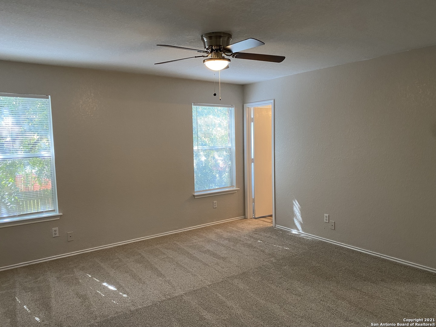 511 Mathis Meadow San Antonio, TX 78251 - Photo 11 of 13 a view of an empty room with a window