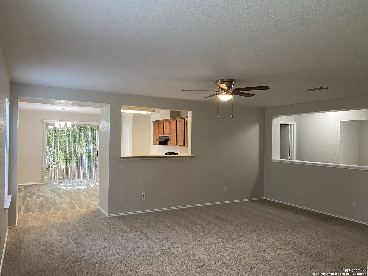 511 Mathis Meadow San Antonio, TX 78251 - Photo 2 of 13 a view of an empty room with a window