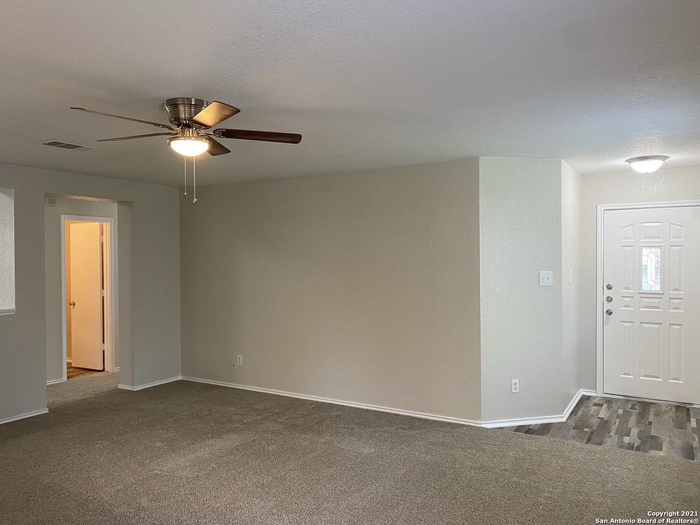 511 Mathis Meadow San Antonio, TX 78251 - Photo 3 of 13 a view of empty room with windows