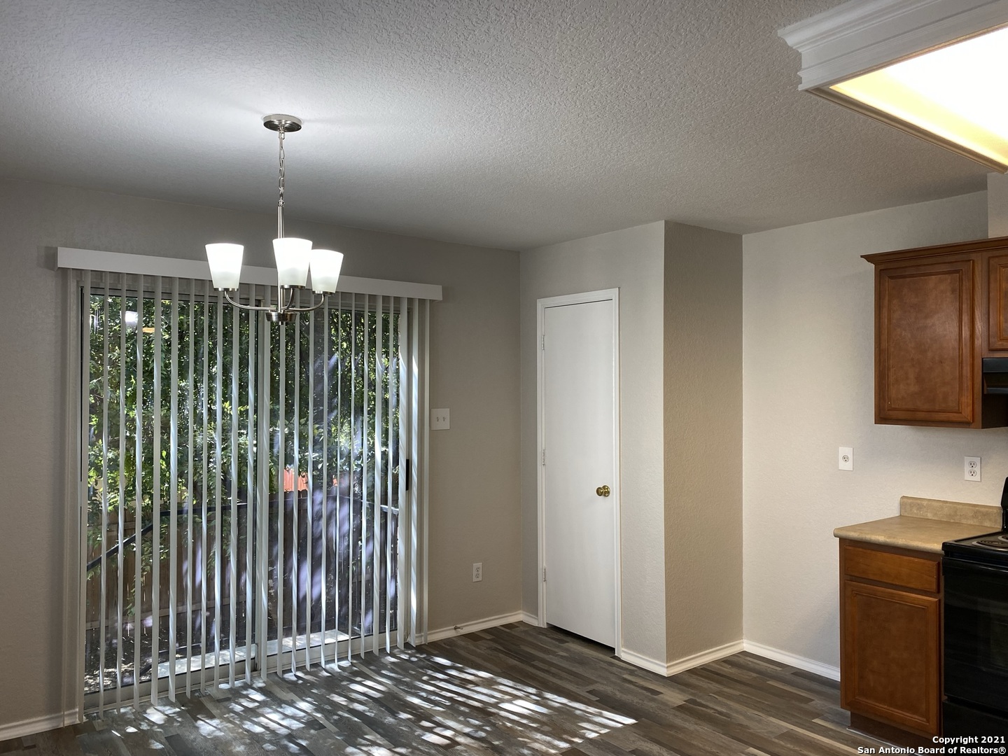 511 Mathis Meadow San Antonio, TX 78251 - Photo 5 of 13 a view of a livingroom with a chandelier