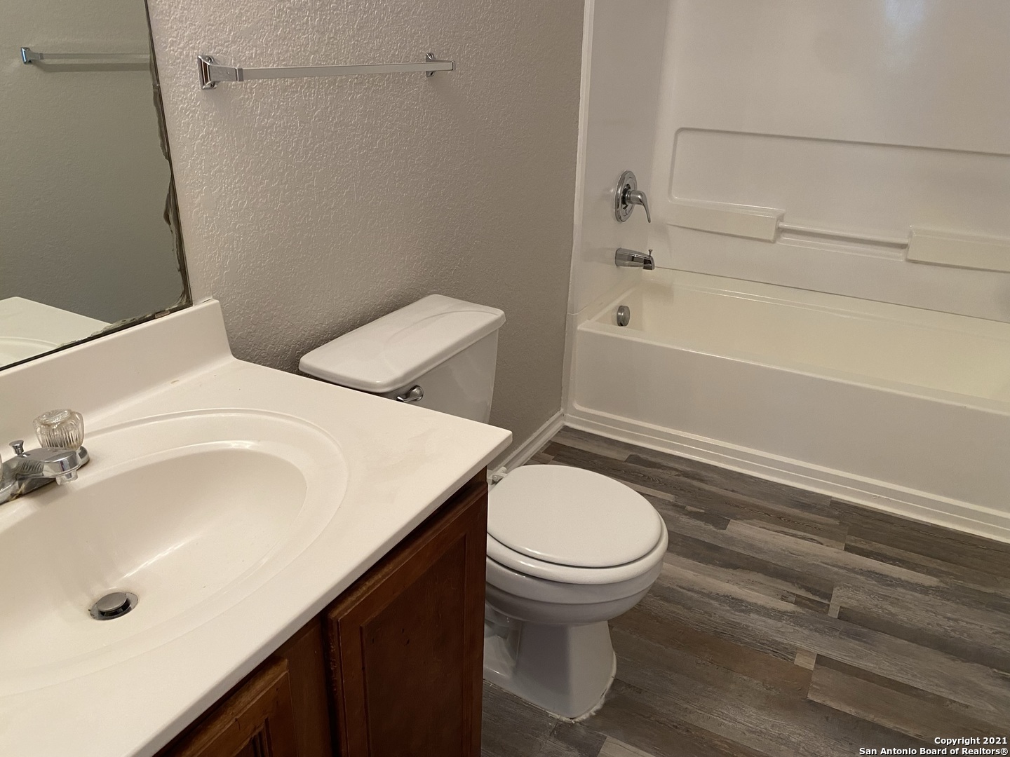 511 Mathis Meadow San Antonio, TX 78251 - Photo 9 of 13 a bathroom with a sink toilet and shower