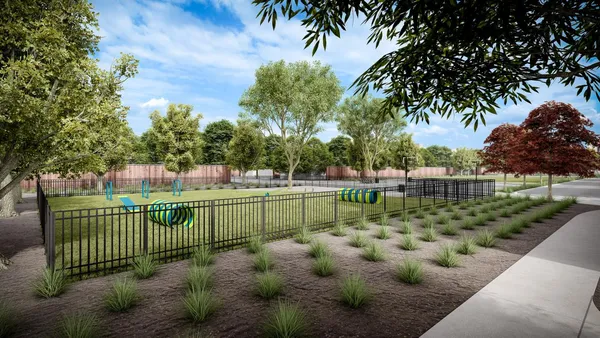 a view of a garden with a sitting area