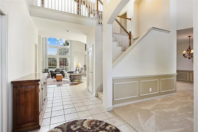 a view of a livingroom with furniture and front door