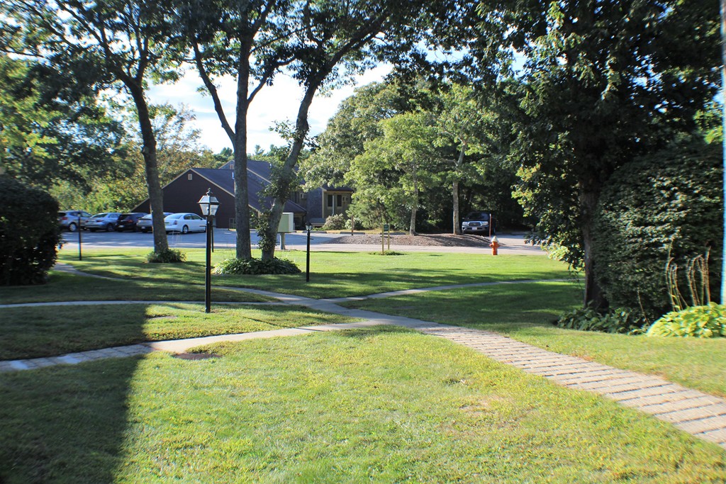 33 Round House Road, Unit 33 Bourne, MA 02532 - Photo 2 of 11 a view of a park with tree s