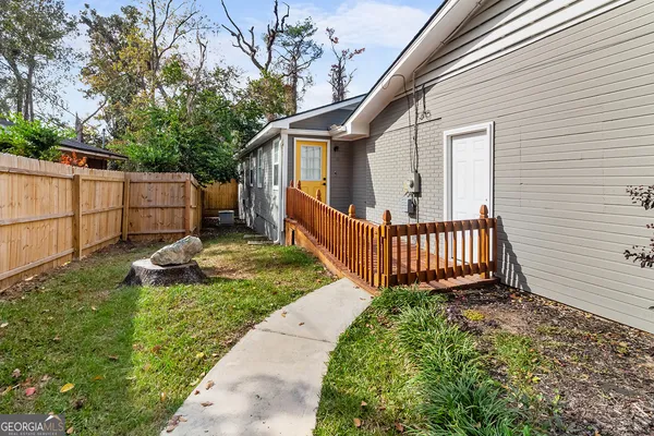 a view of a deck with a fence