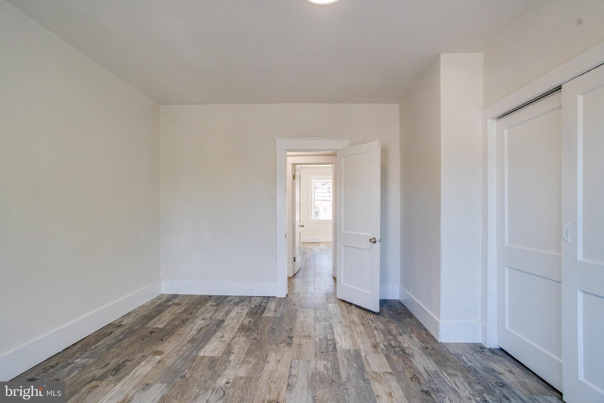 5878 Belair Road Baltimore, MD 21206 - Photo 29 of 41 a view of an empty room and window