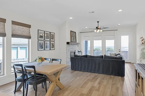 a view of a dining room with furniture and window