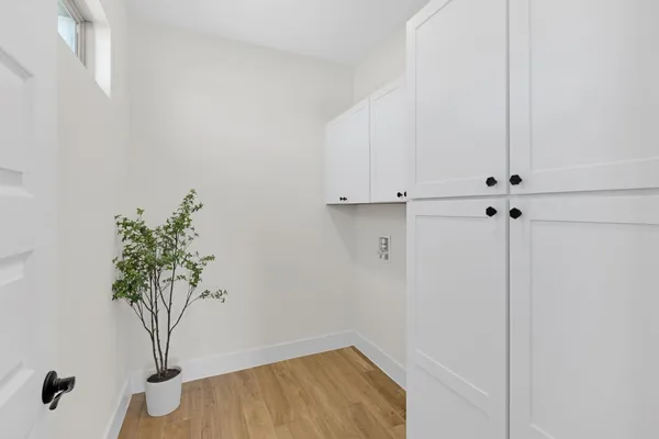 a view of small space with wooden floor