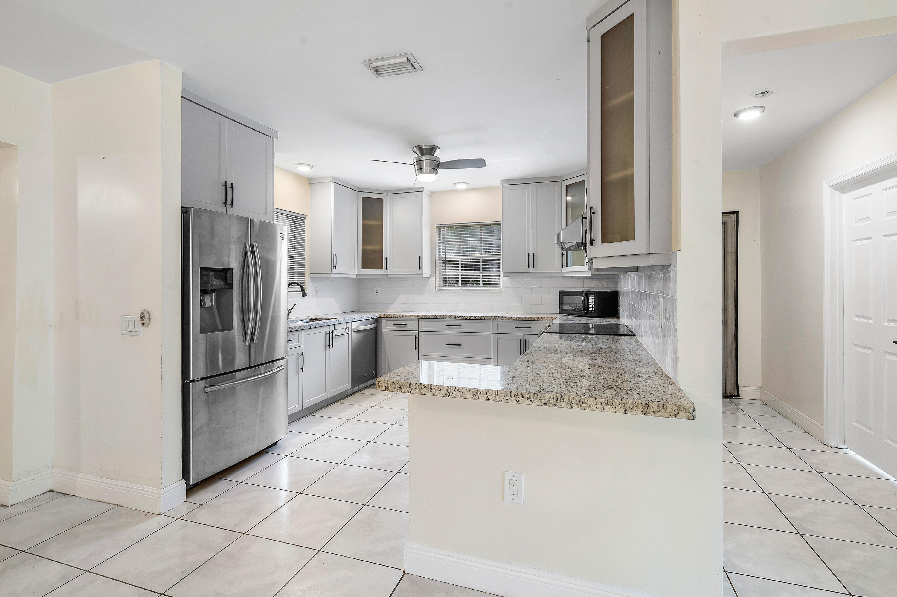 6130 Edwards Road Pompano Beach, FL 33063 - Photo 7 of 17 011-6130EdwardsRoad-Margate-FL-33063-FUL