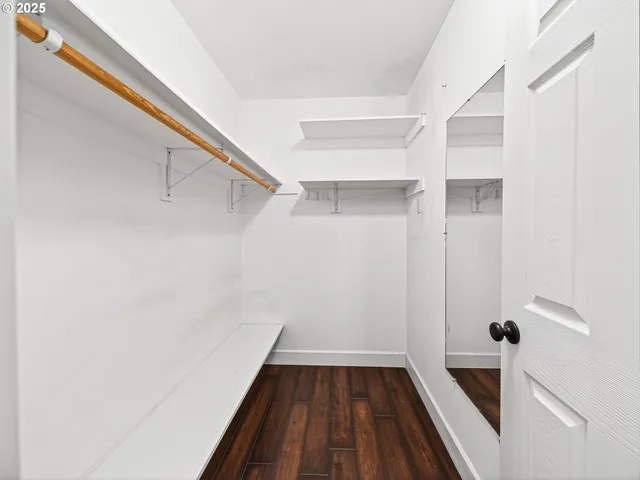 a view of a room with racks on the wall