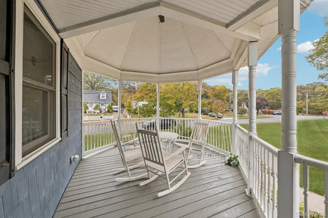 a view of a chairs on the roof deck