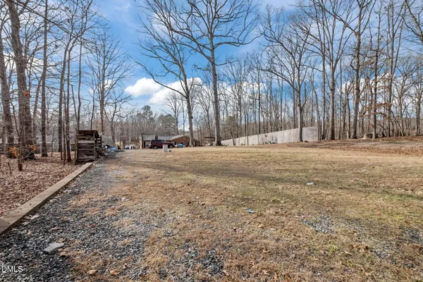 a backyard of a house with trees