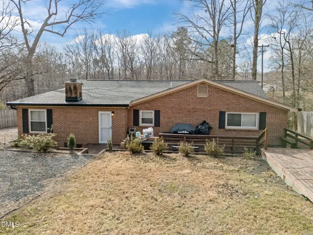 a front view of house with yard outdoor seating and yard