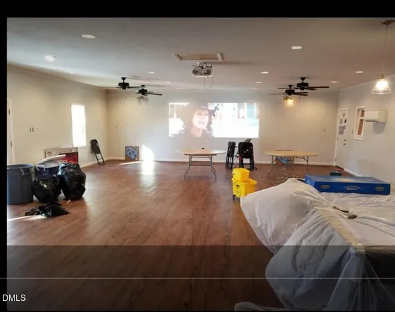 a view of a living room and kitchen