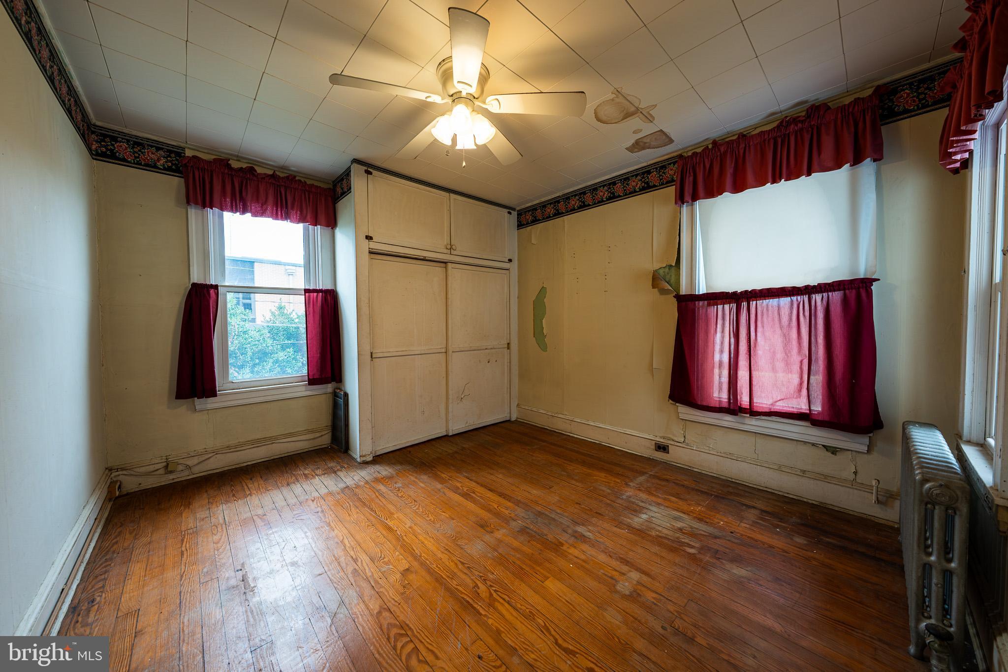 9 Church Lane Baltimore, MD 21208 - Photo 18 of 31 an empty room with windows