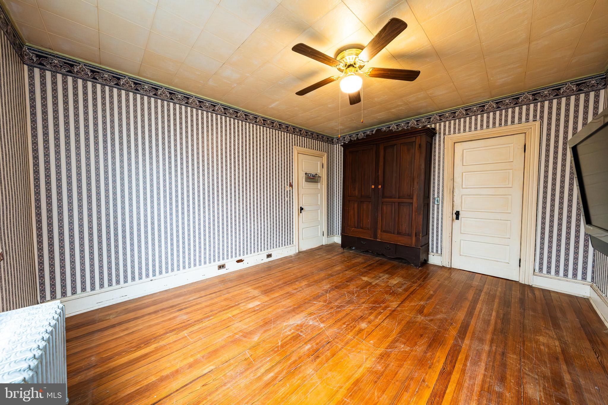 9 Church Lane Baltimore, MD 21208 - Photo 22 of 31 a view of a livingroom with a ceiling fan