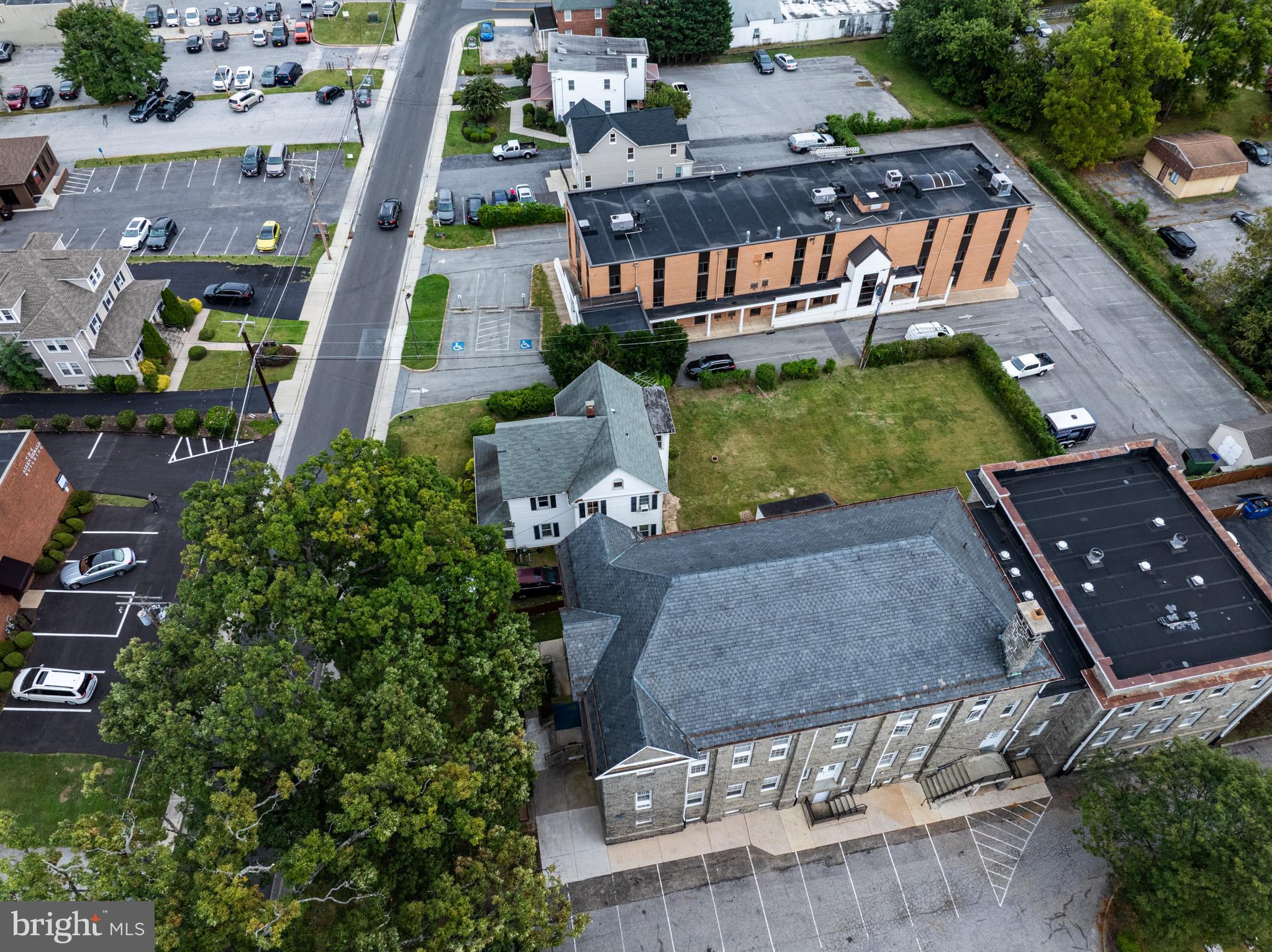 9 Church Lane Baltimore, MD 21208 - Photo 3 of 31 an aerial view of a house with garden space and street view