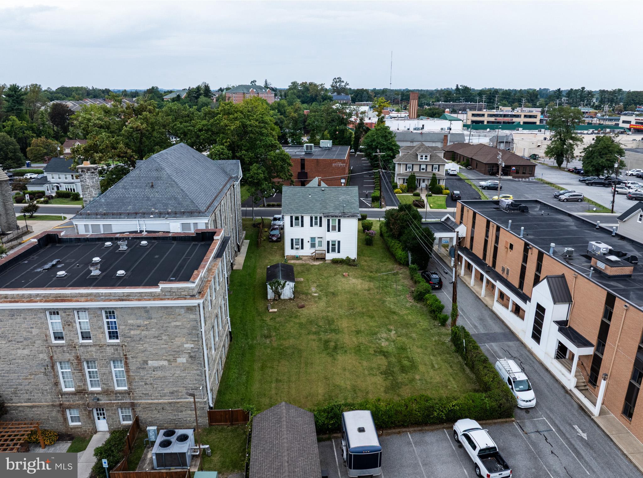 9 Church Lane Baltimore, MD 21208 - Photo 4 of 31 an aerial view of multiple houses with yard
