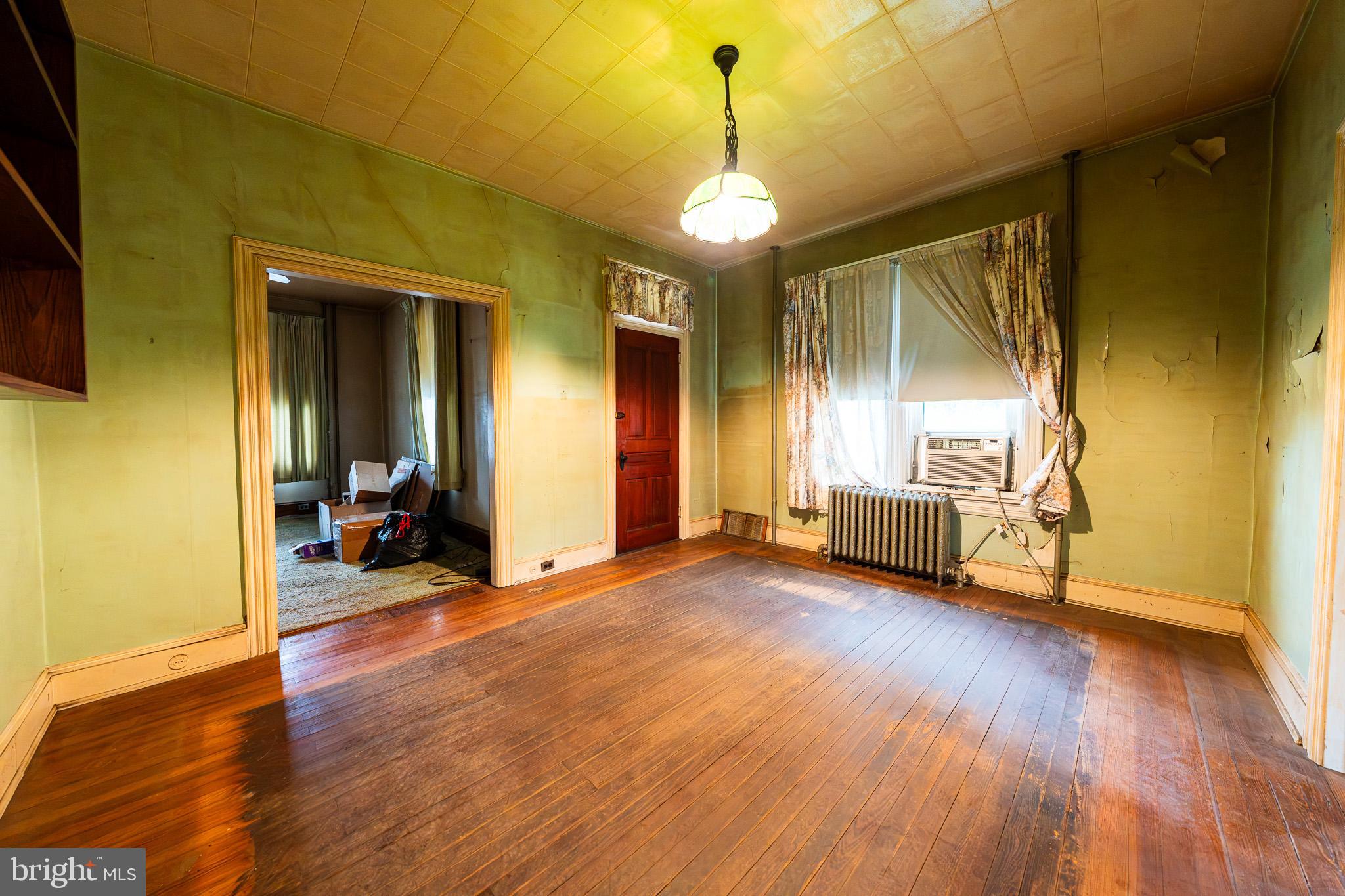 9 Church Lane Baltimore, MD 21208 - Photo 7 of 31 a view of a livingroom with a hard wood floor