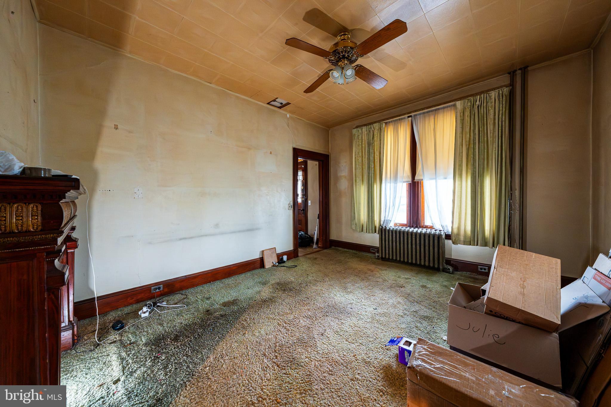 9 Church Lane Baltimore, MD 21208 - Photo 10 of 31 a view of an empty room with a window