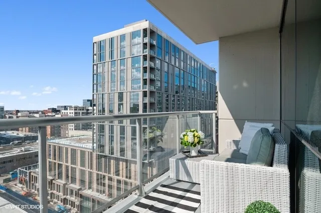 a view of balcony with furniture