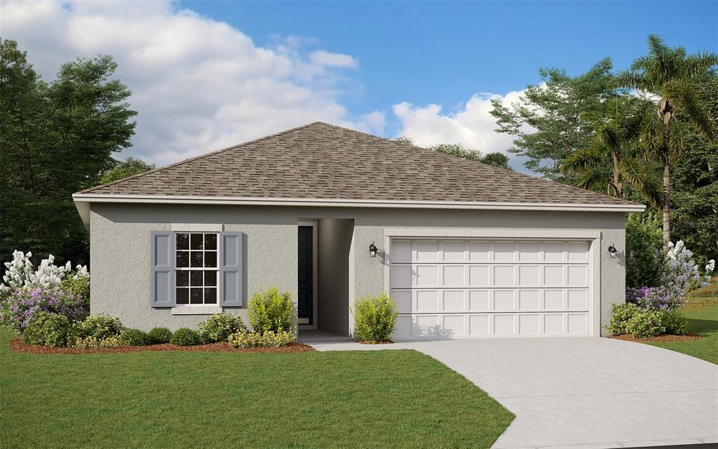 3707 Eisel Way Haines City, FL 33844 - Photo 1 of 1 a front view of a house with a garden and plants