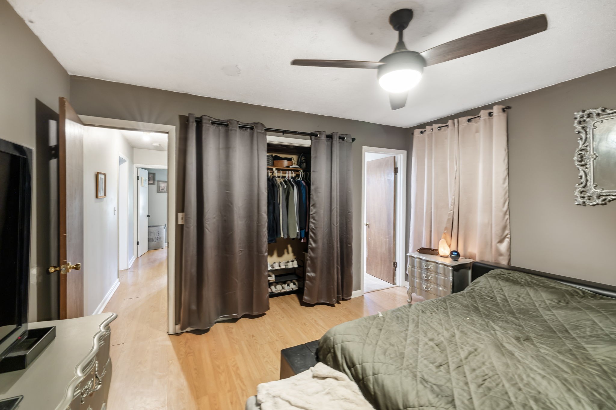 3016 Pocahontas Road Morrison, TN 37357 - Photo 20 of 47 a bedroom with a bed and a chandelier